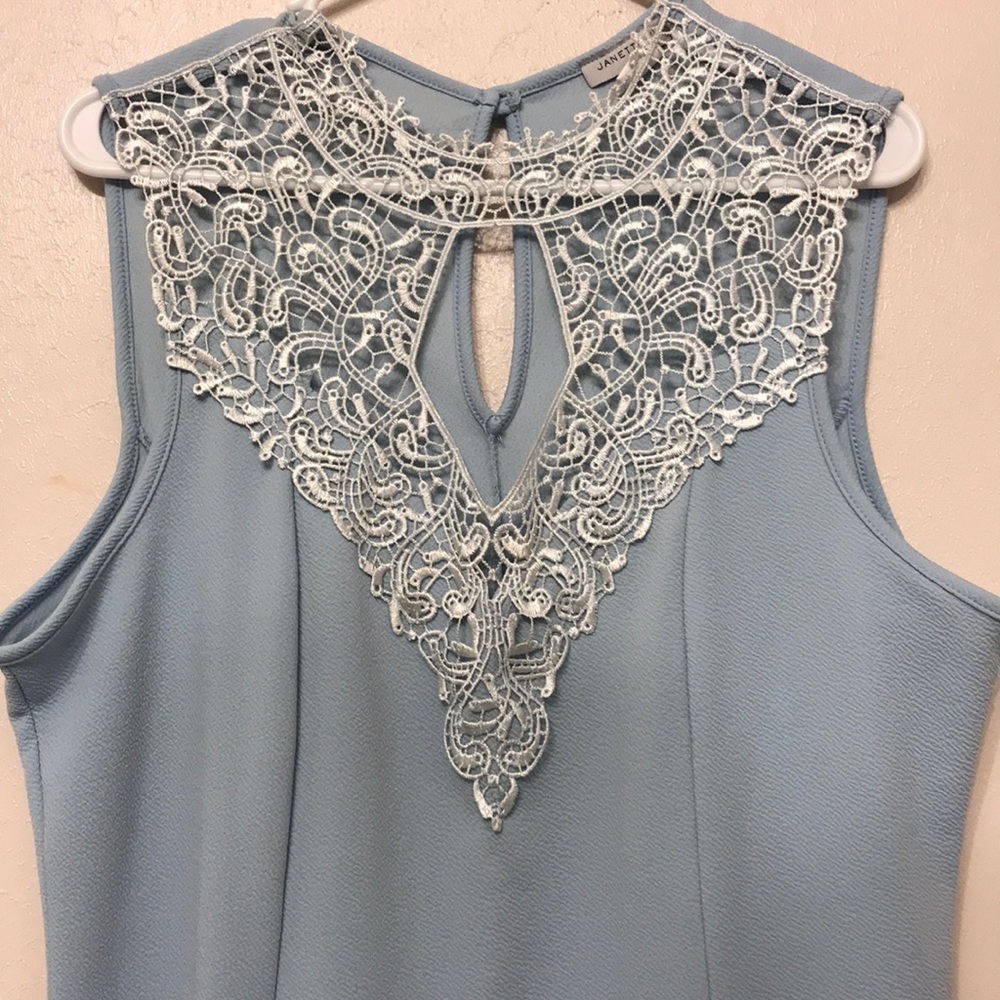 Blue shirt sleeve dress shirt.